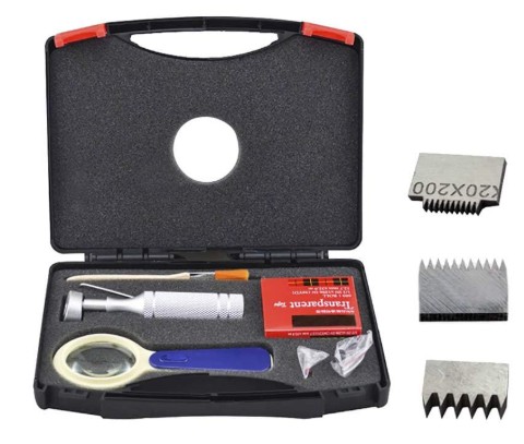 A cross-hatch adhesion test kit: cutter handle, spare multi-blade cutting heads, test tape, brush and magnifier in a case