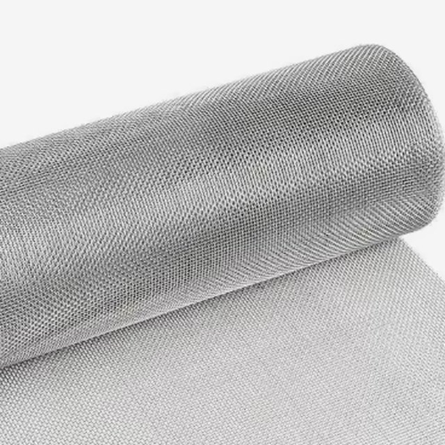 A roll of stainless steel screen printing mesh with a metallic sheen